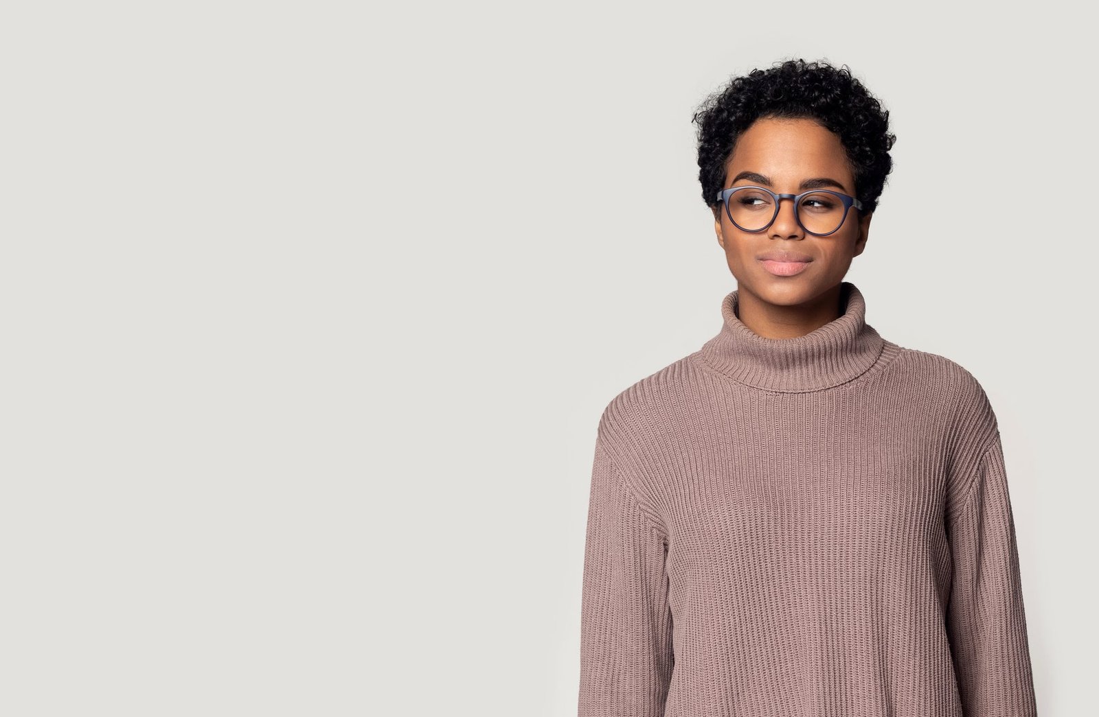 A woman wearing prescription spectacles fitted at Vision & Optics, Thane