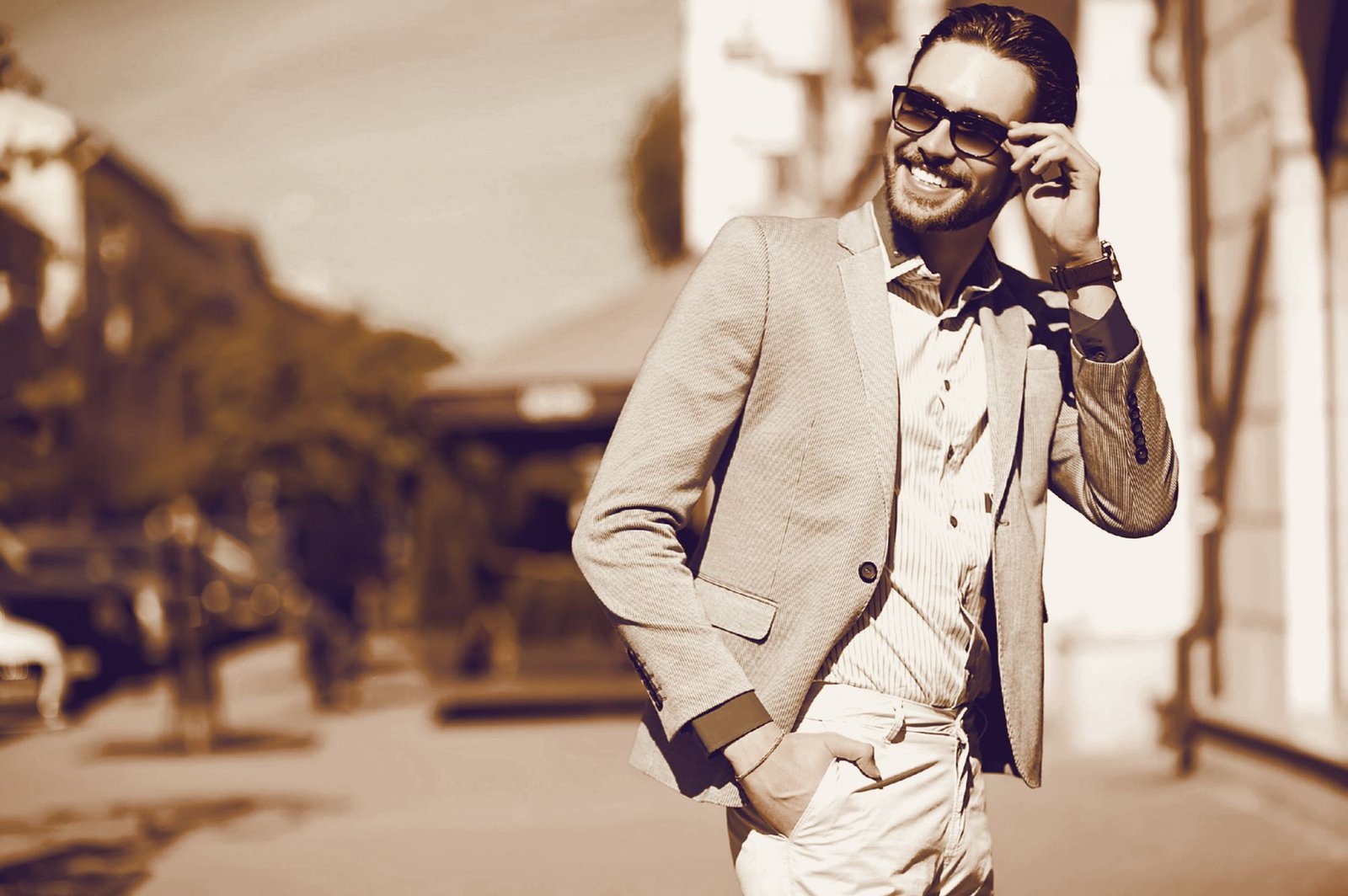 Man wearing sunglasses on the street — spectacles and sunglasses from the Vision & Optics optical shop in Thane