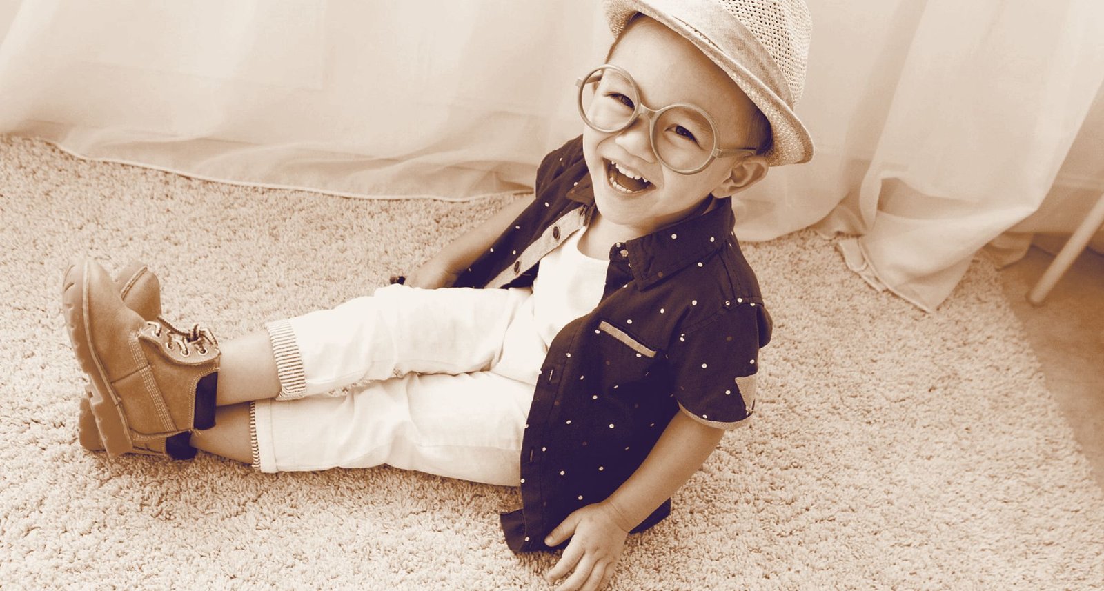 Young child wearing round spectacles — kids glasses at Vision & Optics, Thane