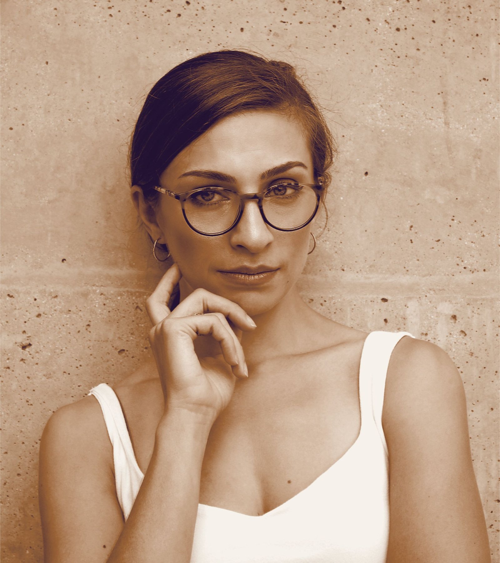 Woman wearing prescription spectacles fitted at the Vision & Optics optical shop in Thane